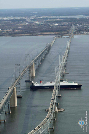 A Cargo Ship Pass Under the Chesapeake Bay Bridge