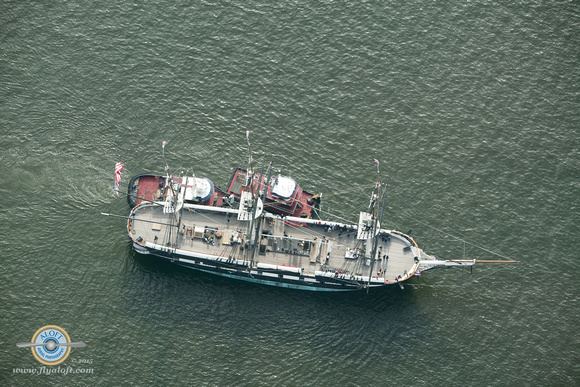 Tug Boats Assist USS Constellation